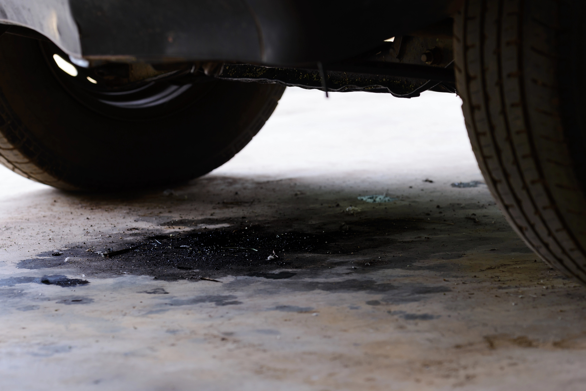 Oil stains from the car on the driveway