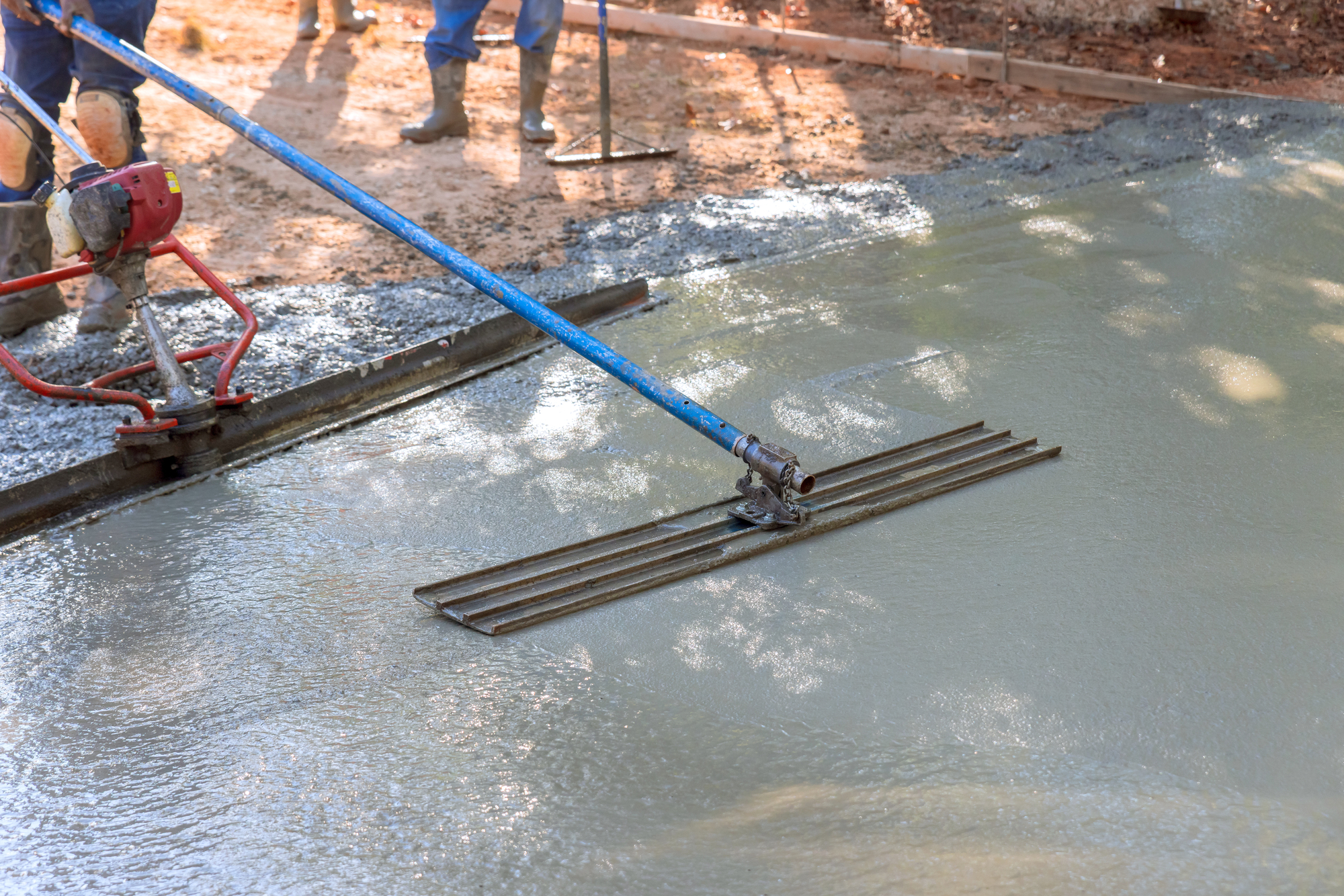 Leveling the cement for driveway repair