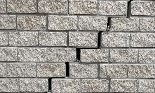 man working on foundation problem