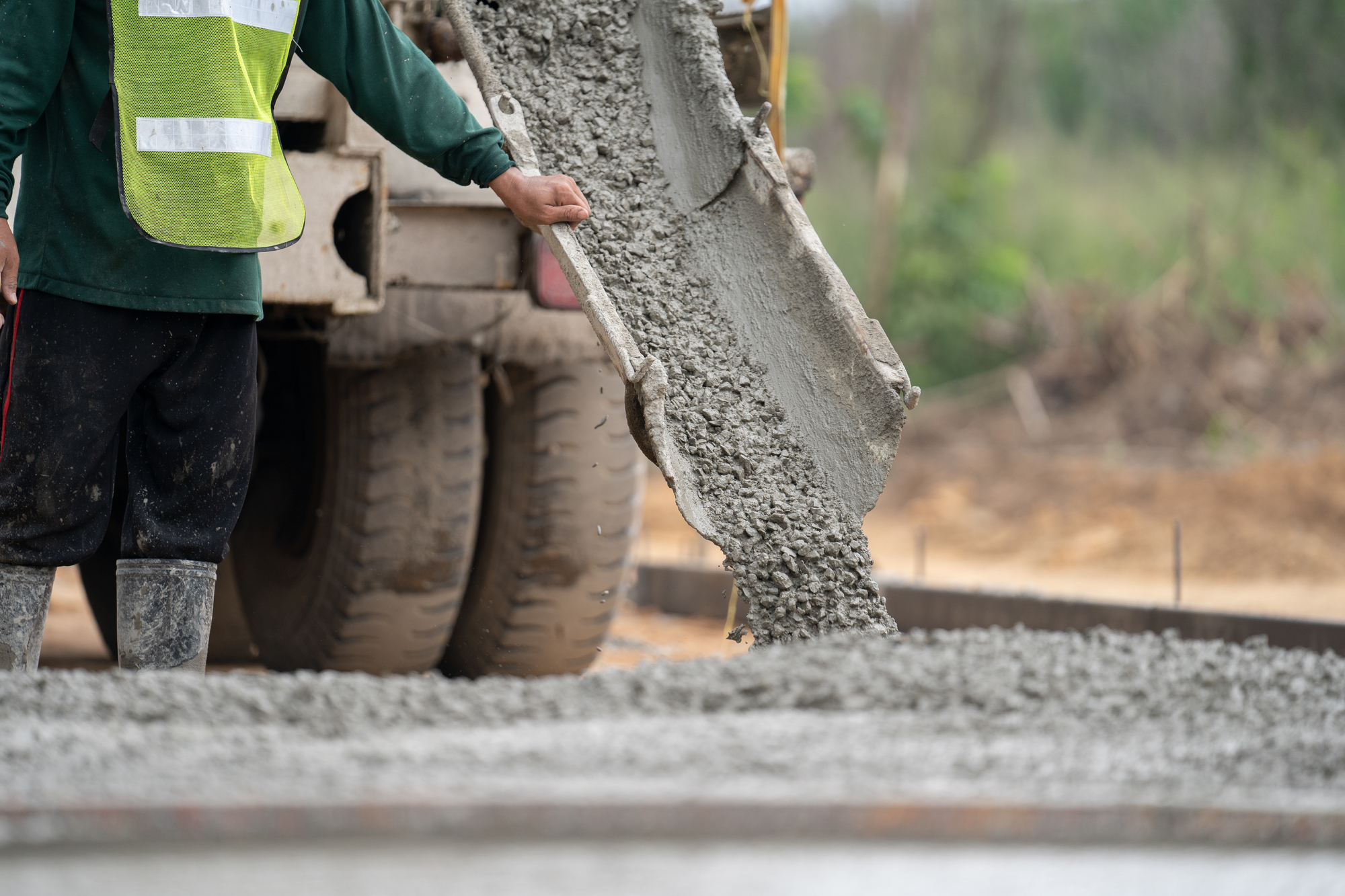Pouring concrete in driveway