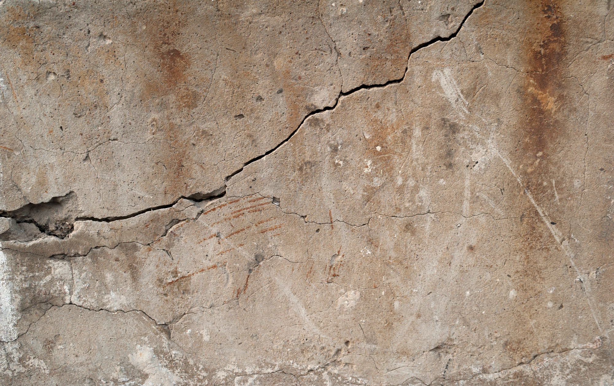 Texture of old wall covered with gray stucco